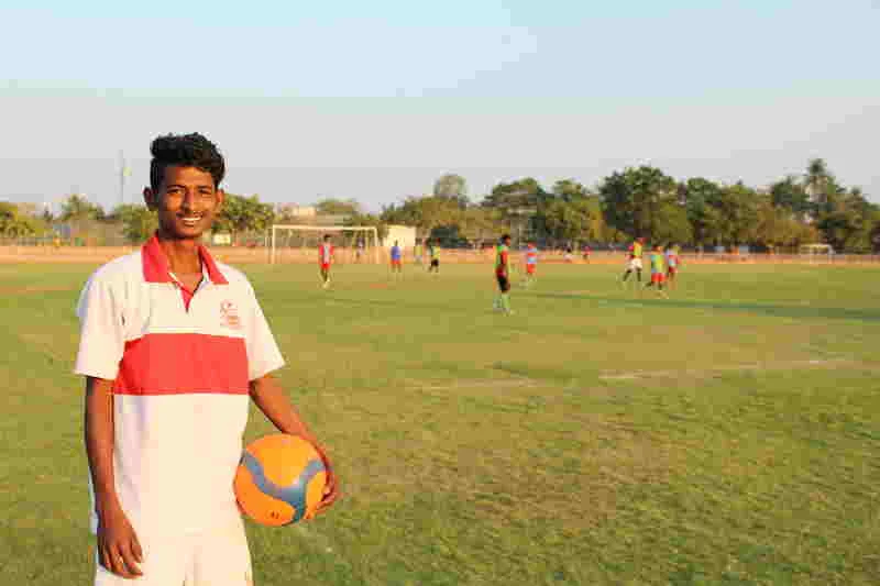 K. Anand Reddy photographed on an ASA football field