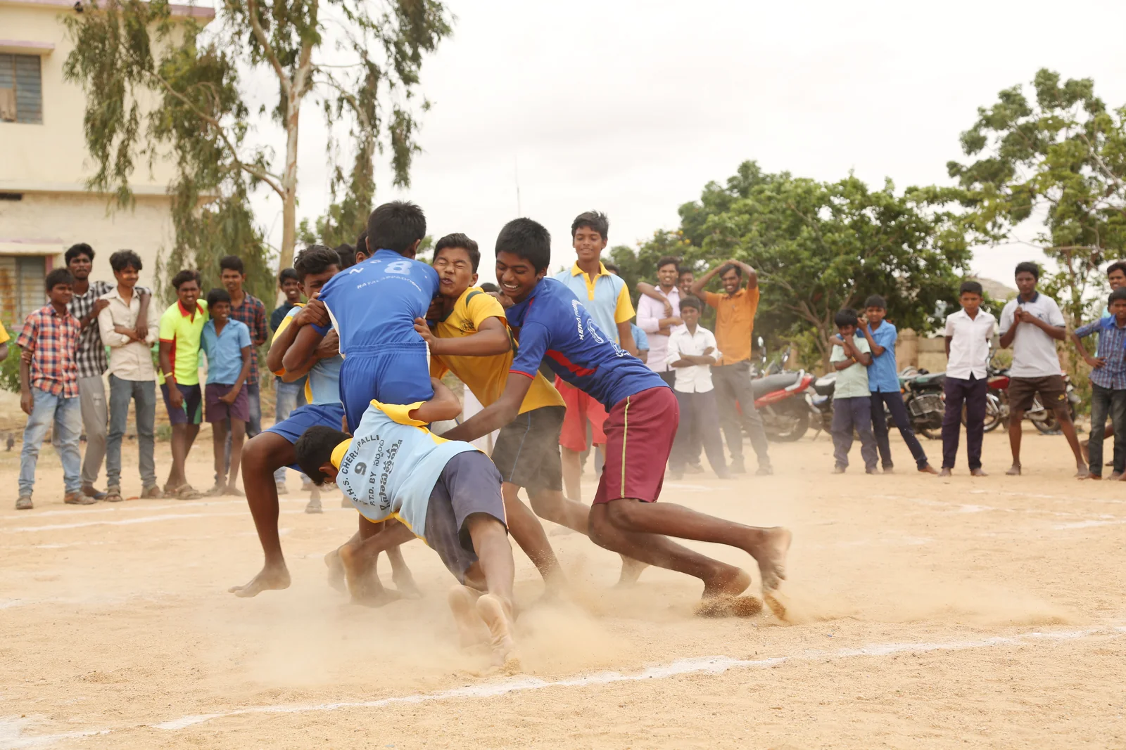 Young athletes taking part in a village kabaddi match at ASA