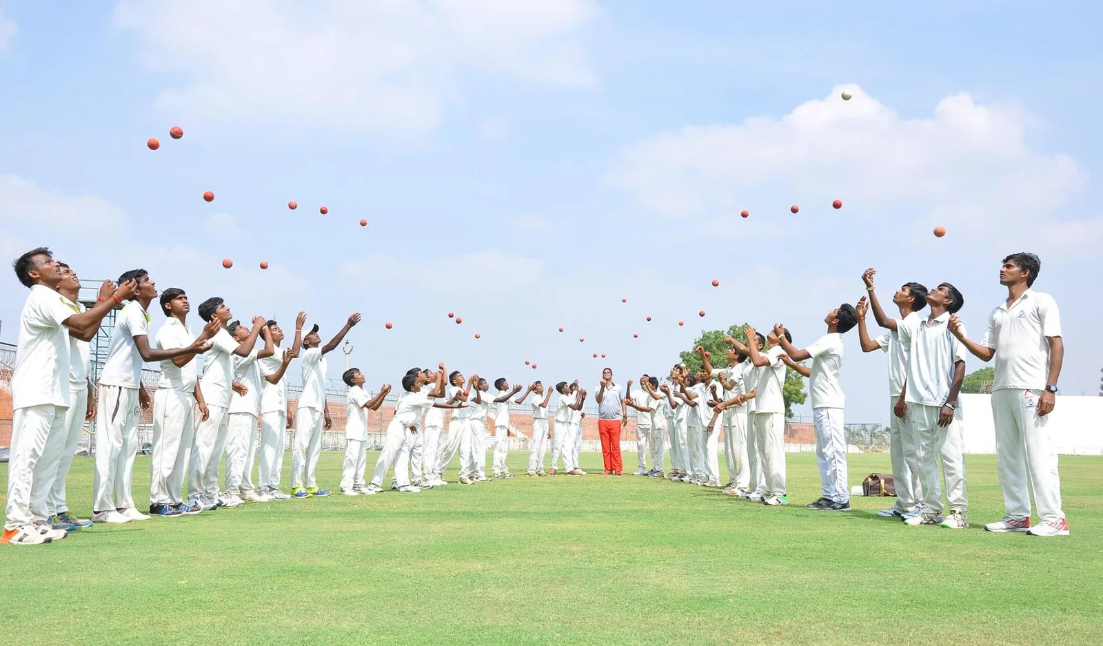 ASA athletes celebrating together on a cricket ground